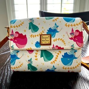 Gently used Sleeping Beauty Dooney and Bourke crossbody!